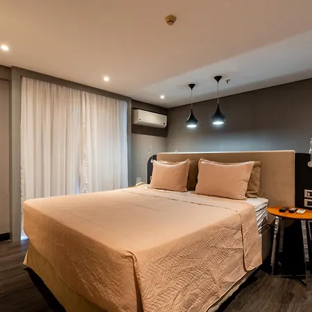 Grand Mercure Brasilia Eixo Monumental Exterior photo A bedroom in a hotel